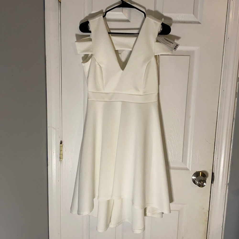 New with tag, ivory skater dresses.